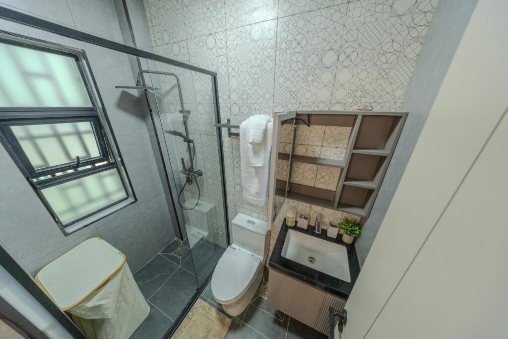 Modern bathroom with glass shower in a Westlands 1 bedroom apartment