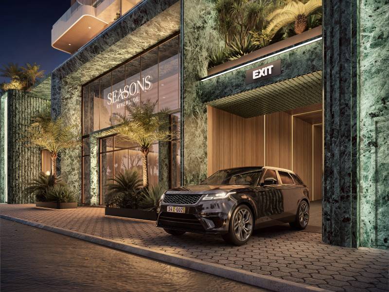 Secure vehicle entrance at Seasons Riverside Apartments at night