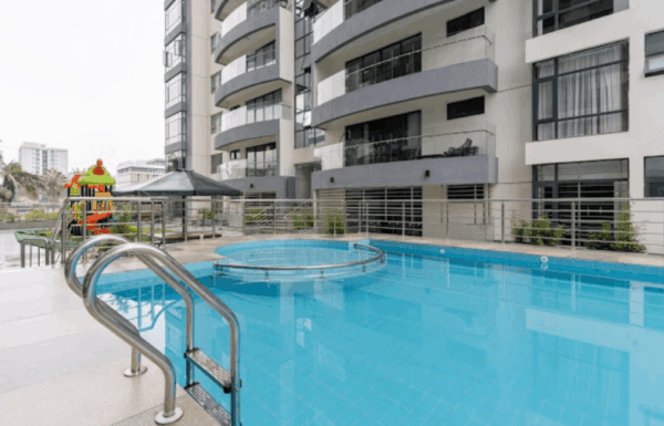 Outdoor swimming pool, children's pool, and apartment balcony exterior at Diamond Oak Residences in Kileleshwa, Nairobi.