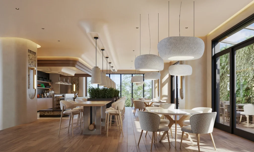 Ground floor residents cafe and dining lounge with pendant lights at Aera Westlands