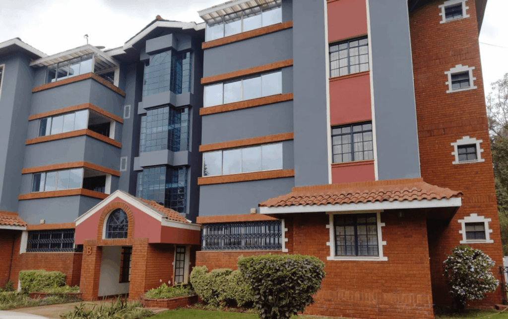 Red brick and grey exterior facade of Capital Apartments 18-unit residential building in Valley Arcade Lavington