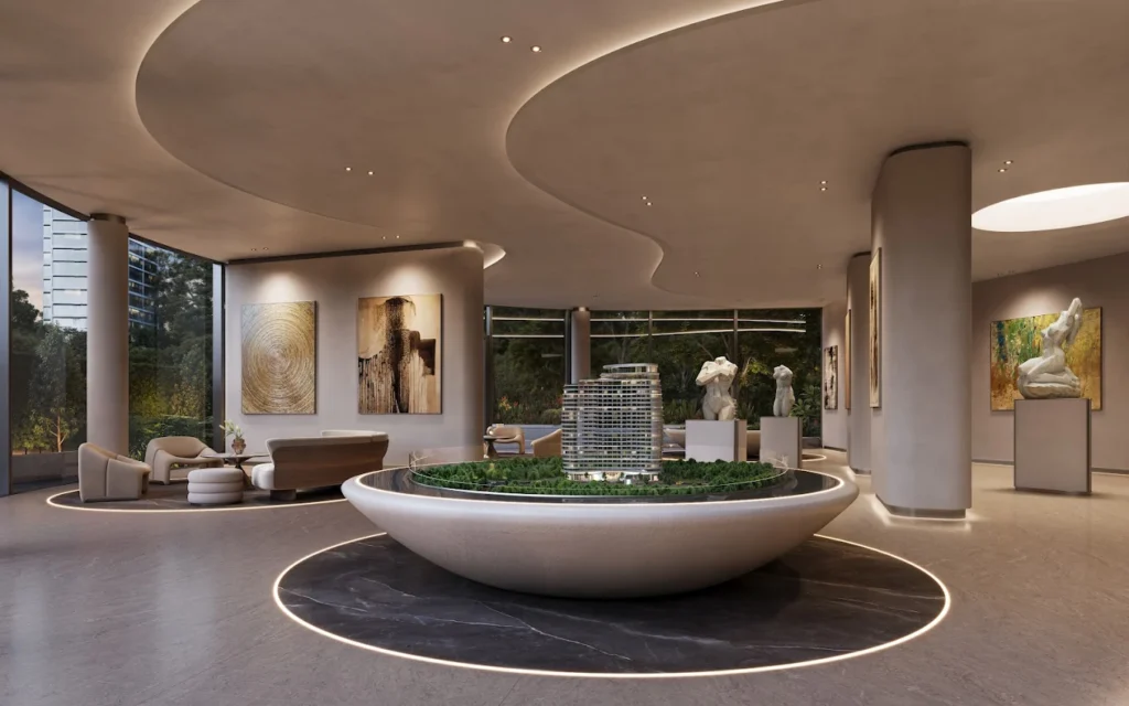 Grand entrance lobby with architectural scale model, sculptures, and art gallery at Cheval Riverside