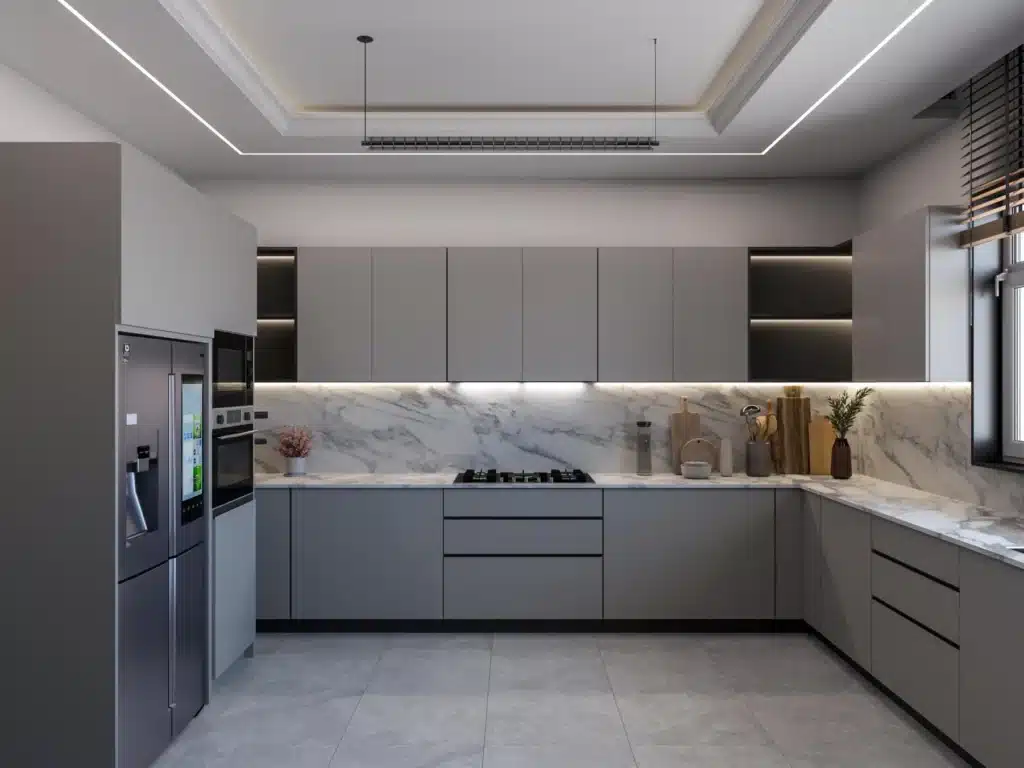Fitted L-shaped matte grey kitchen with Calacatta marble backsplash and gas hob at Rosemont Residence Kilimani