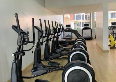 Fully equipped resident gym with cardio ellipticals at Urban Oasis Lavington