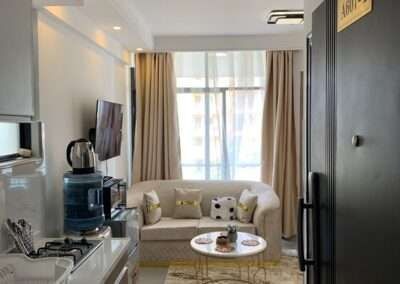 Open plan studio living space and kitchen counter setup at Valley Heights Apartments Lavington